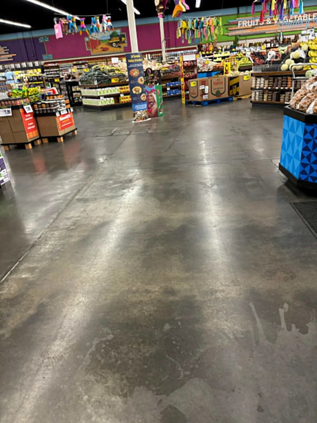 Grocery store concrete floor polished to a shine