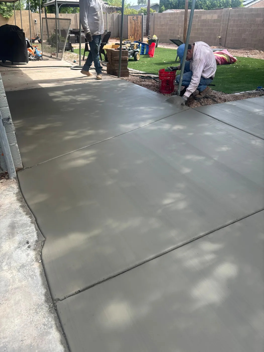 Fresh concrete driveway poured by the FECS crew in Phoenix